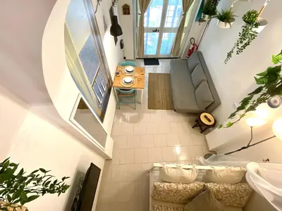 an overhead view of a small room with a table at Trastevere Loft Leopardo in Rome