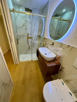a bathroom with a toilet and a sink and a shower at Scala 36, Trastevere, Rome in Rome