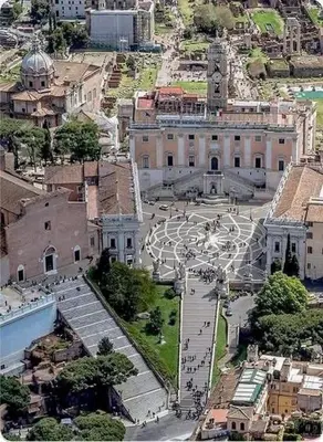 an aerial view of a large building with a clock tower at Foro Romano Apartments D in Rome