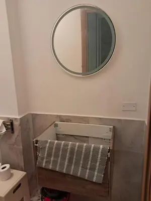 a bathroom with a mirror and a towel rack at Vaticano in Love in Rome