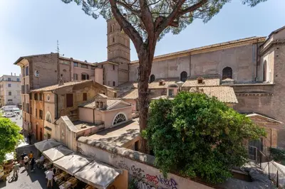 an overhead view of a city with a clock tower at Zenaria Trastevere, Zen Design in Heart of Rome in Rome