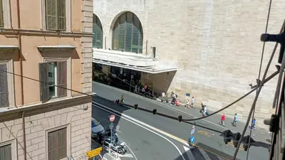 an overhead view of a city street with a building at little roma apartment in Rome