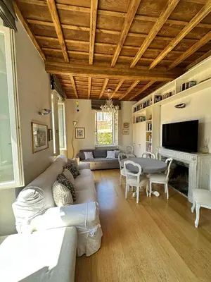 a living room with a couch and a table at Roman Dream Stay in Rome