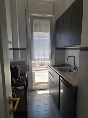 a small kitchen with a sink and a window at Celestina Holiday Home Policlinico Gemelli in Rome