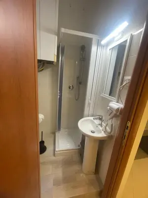 a bathroom with a sink and a shower at Rome jubilee stays 2 in Rome
