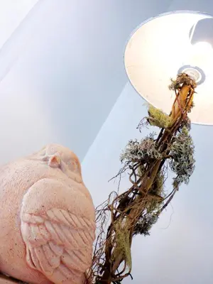 a statue of a head with a street light at B&B More Than Rome in Rome