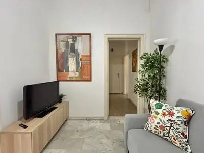 a living room with a tv and a couch at Cipro Vatican Home in Rome