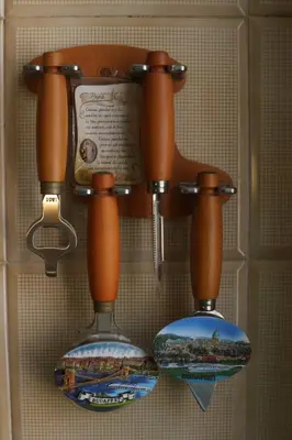 a couple of vases hanging on a wall at Artist's House Colosseum in Rome