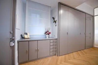 a large closet with a telephone in a room at Dolce Vita Suite by Rental in Rome in Rome