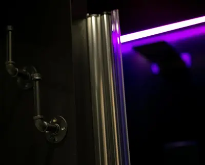 a close up of a door with a purple light at Jb Relais Luxury in Rome