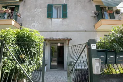 an entrance to a building with a door and window at Appartamento Iris in Rome