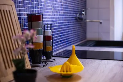 a bathroom with a yellow rubber duck on the floor at New 3BR-2 Baths Near Vatican & Metro- The Comics House in Rome