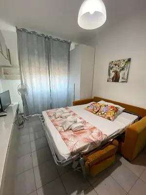 a bedroom with a bed in a room at Casa Vacanze Domus 46 in Rome