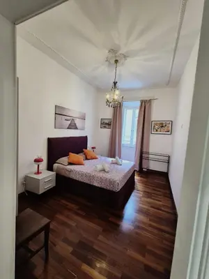 a bathroom with a shower with a glass wall at Colosseum Apartment, 3 bedrooms, 3 baths, large living room with a sofa bed, the apartment can accommodate 8 people in Rome