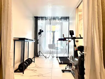 a room with a camera and a tripod and a window at Romantic Rome Suite Aureliana in Rome