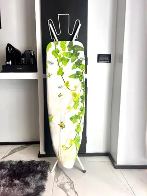 a surfboard with green leaves on it in a room at Romantic Rome Suite Aureliana in Rome