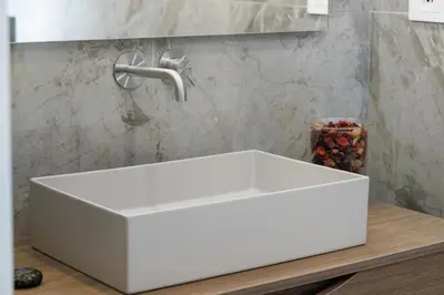 a white sink on a counter in a bathroom at La Dimora di Piazza Mazzini in Rome