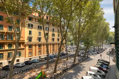 a street filled with parked cars in a parking lot at La Dimora Luxury Piazza Mazzini in Rome