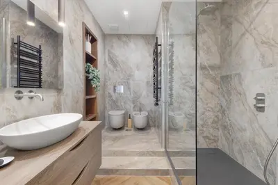 a bathroom with a sink and a shower at La Dimora Luxury Piazza Mazzini in Rome