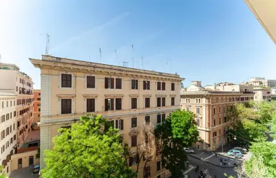 a view of a building in a city at Volpetti Experience-Suite in Vatican City in Rome