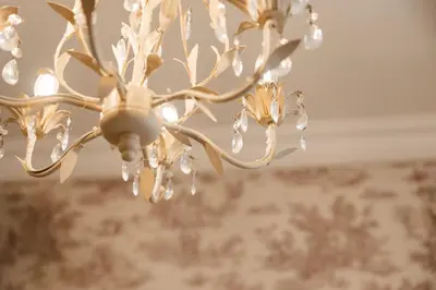 a chandelier hanging from a ceiling in a room at Candy Lodge in Rome