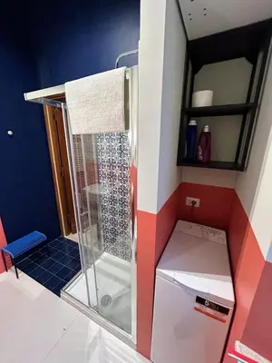 a bathroom with a shower in a lego house at Casa Troccoli in Rome
