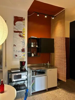 a kitchen with a sink and a counter top at Casa Troccoli in Rome