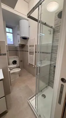 a bathroom with a shower and a toilet at Casa Francesco in Rome