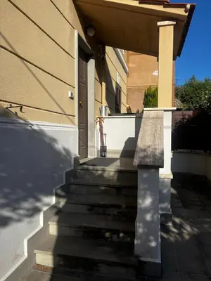 a set of stairs in front of a house at Casa Jacomini in Rome