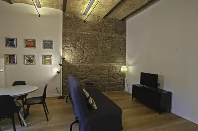 a living room with a couch and a table at Appartamento Pigneto in Rome