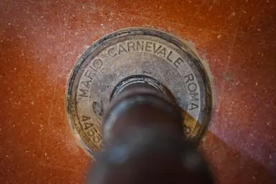 a close up of a metal object on a table at Trastevere Luxury Apartment in Rome