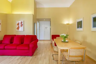 a bedroom with a large bed and a window at Rome Central Suite via Porcari in Rome