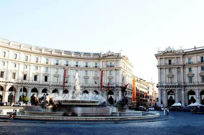 a fountain in front of a large building at Rome Center Attic Penthouse in Rome