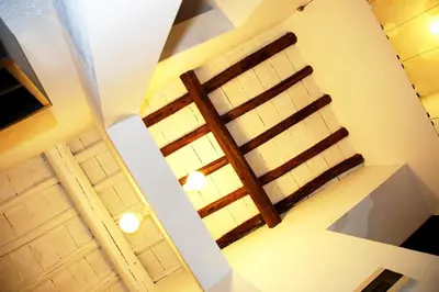 an overhead view of a staircase in a building at Rome Center Attic Penthouse in Rome