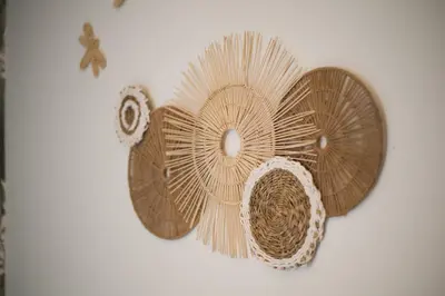 a wall with a fan and a bird nest at Radio Suites in Rome
