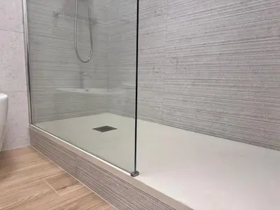 a shower with a glass door in a bathroom at Luxury Apartment Metro Cornelia in Rome
