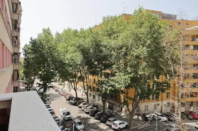 a view of a city street with cars parked at Circo Massimo House by Luxury Getaways in Rome