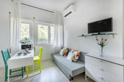 a living room with a couch and a table at Aurelia vetus apartment Rome in Rome