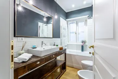 a bathroom with a sink and a toilet at iFlat Charming Hideaway Apt by the Vatican in Rome