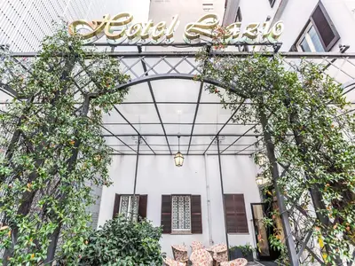 a view of the lobby of a hotel with plants at Raeli Hotel Lazio in Rome
