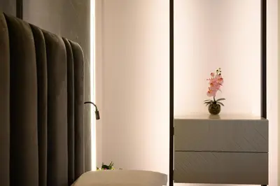 a room with a window with a plant on a shelf at Antinous Suites in Rome