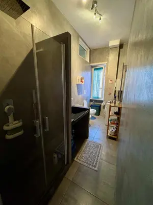 a bathroom with a shower and a sink at Casa Fradella in Rome