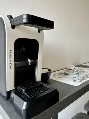 a toaster oven sitting on top of a kitchen counter at The King's house - Rome in Rome
