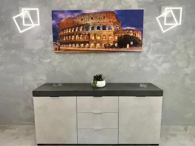 a painting of the colosseum in front of a building at The King's house - Rome in Rome