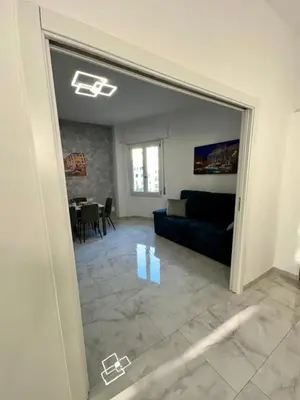 a view of a living room with a mirror at The King's house - Rome in Rome