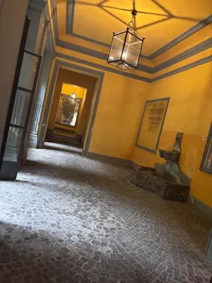 an empty hallway in a building with a ceiling at Golden Suite - un piccolo loft nel cuore di Roma in Rome