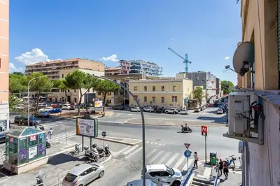 a view of a city street with cars on the road at Furio Flat in Rome