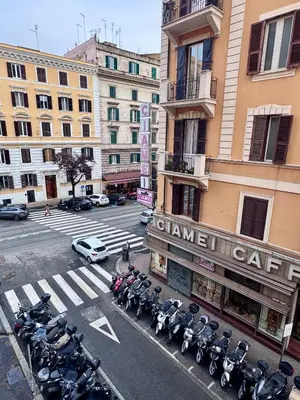 a group of motorcycles parked in front of a building at Appartamento a Roma vicino Metro Vittorio Emanuele in Rome
