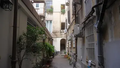 an alley in an alley between two buildings at Navona Apartment in Rome