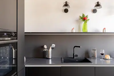 a kitchen with a sink and a counter top at iFlat Peaceful & Charming Hideaway near Vatican in Rome